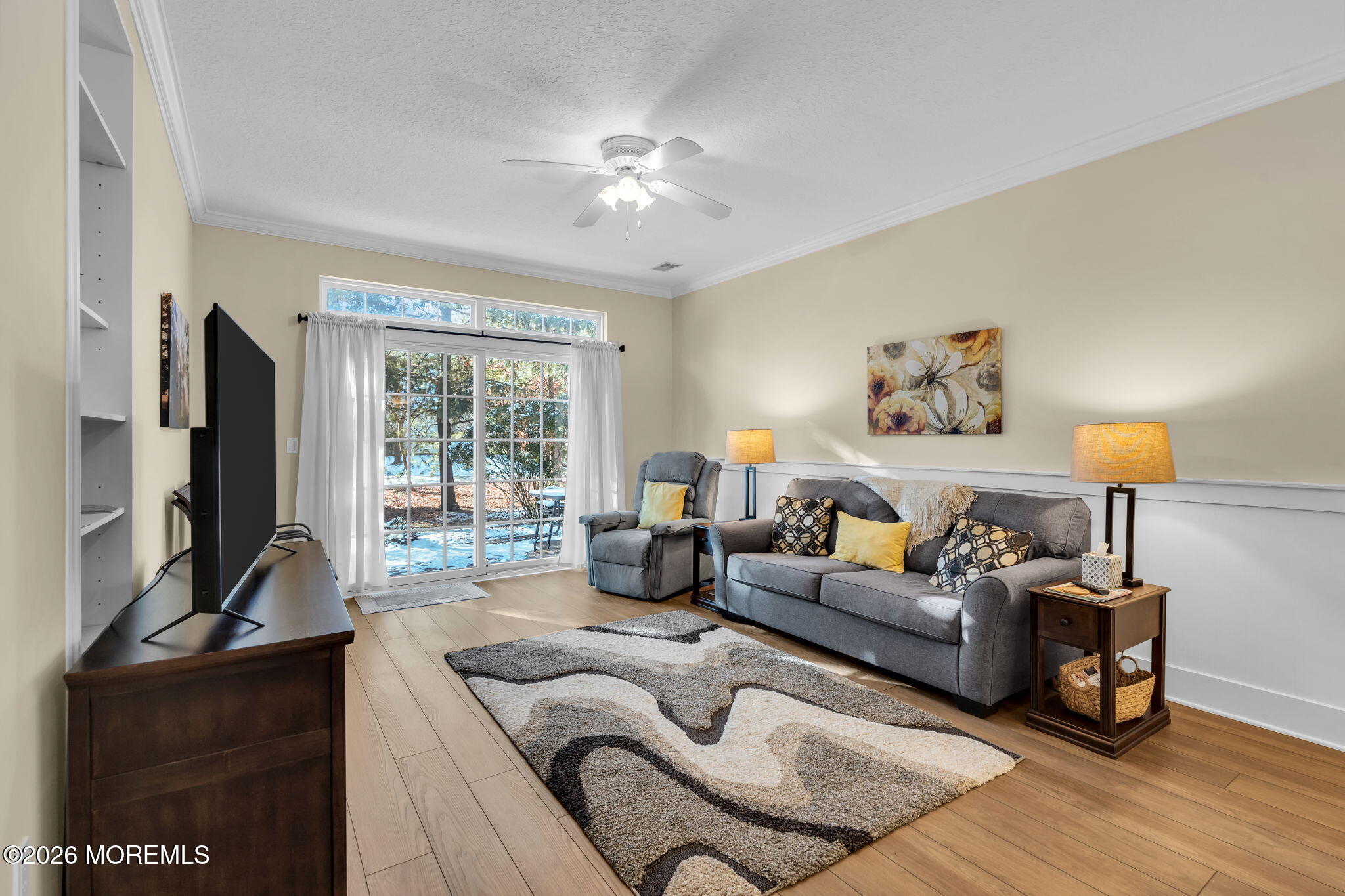 104 Silverlawns Drive Lakewood, NJ 08701 - Photo 15 of 36 a living room with furniture flat screen tv and a large window