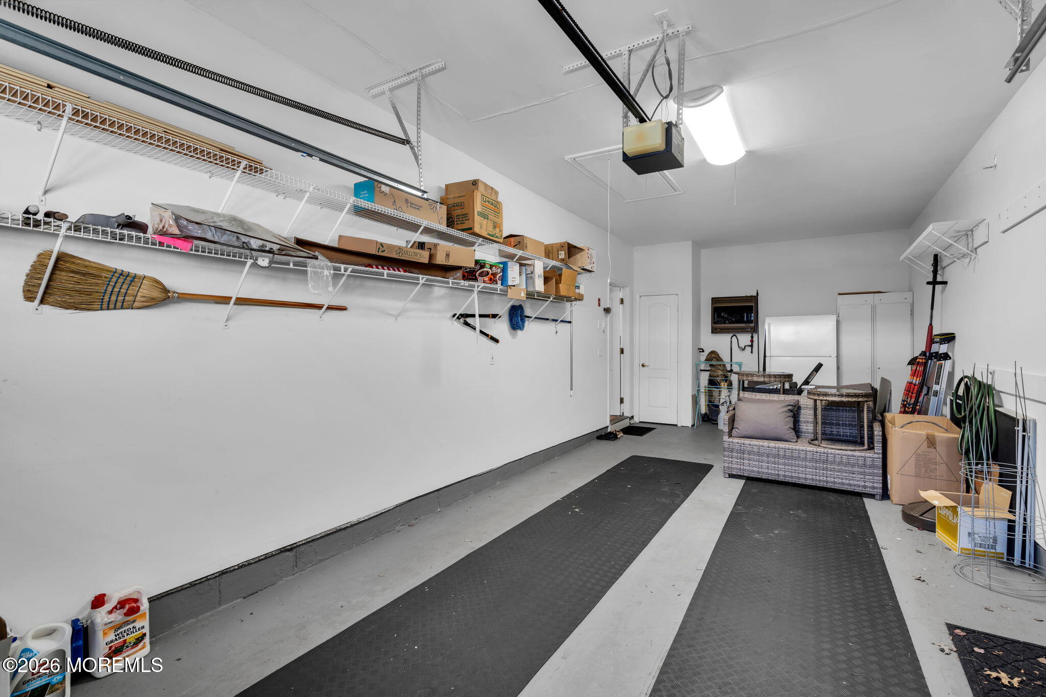 104 Silverlawns Drive Lakewood, NJ 08701 - Photo 20 of 36 a view of a living room and a garage