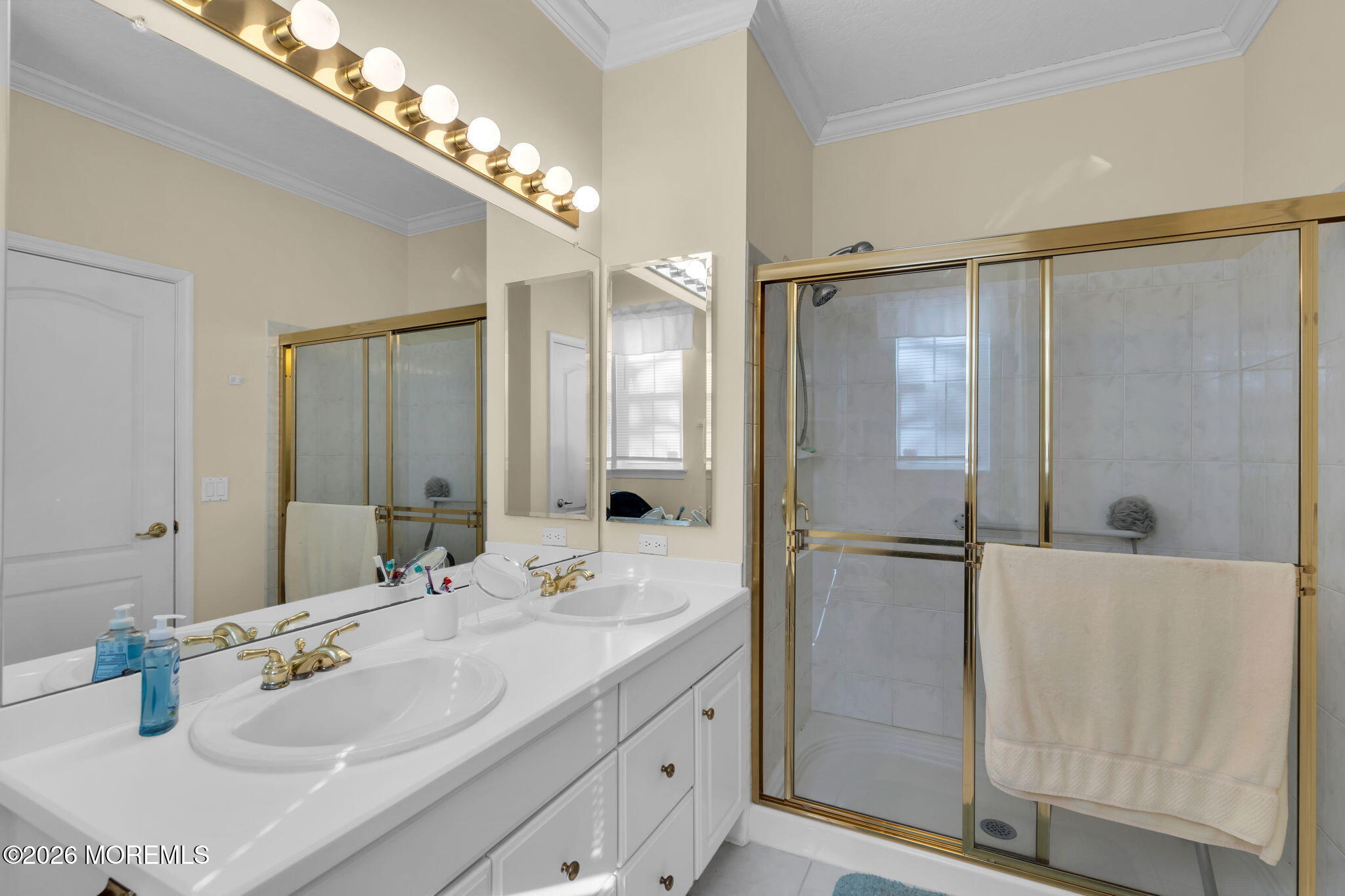 104 Silverlawns Drive Lakewood, NJ 08701 - Photo 27 of 36 a bathroom with a sink double vanity and a mirror