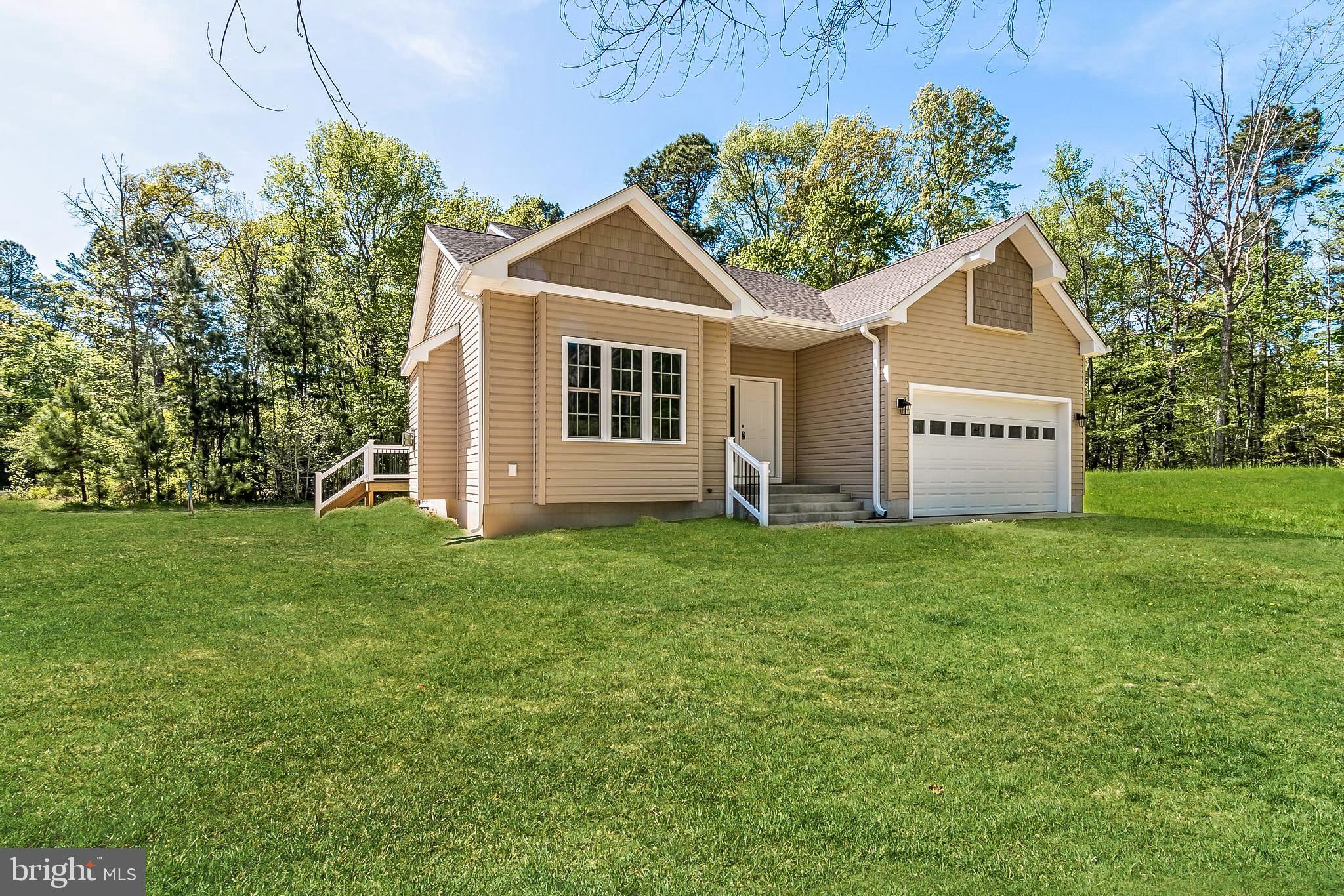 21183 Abell Road Avenue, MD 20609 - Photo 2 of 36 landscaping has been enhanced for marketing*