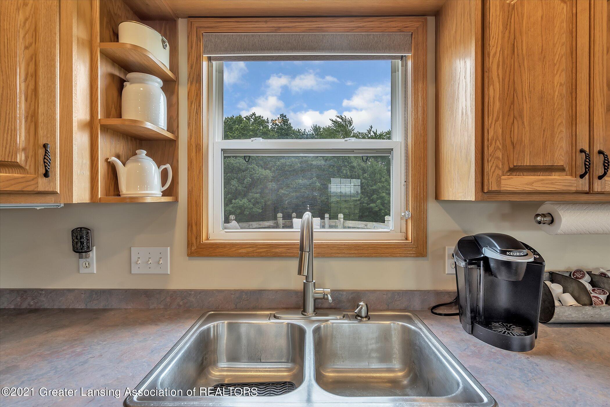 9101 Tucker Road Eaton Rapids, MI 48827 - Photo 16 of 43 16-9101 Tucker Rd-windowstill-realestate