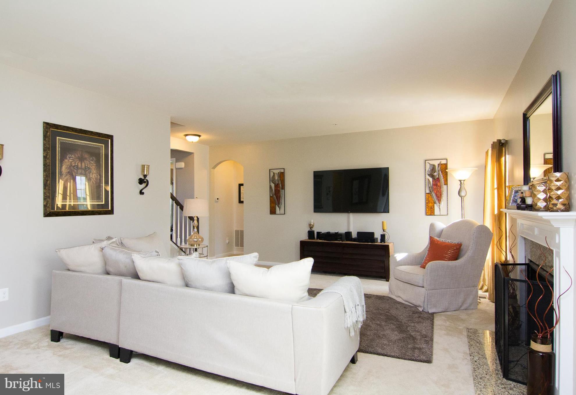 10422 Windlass Run Road Baltimore, MD 21220 - Photo 13 of 30 a living room with furniture and a flat screen tv
