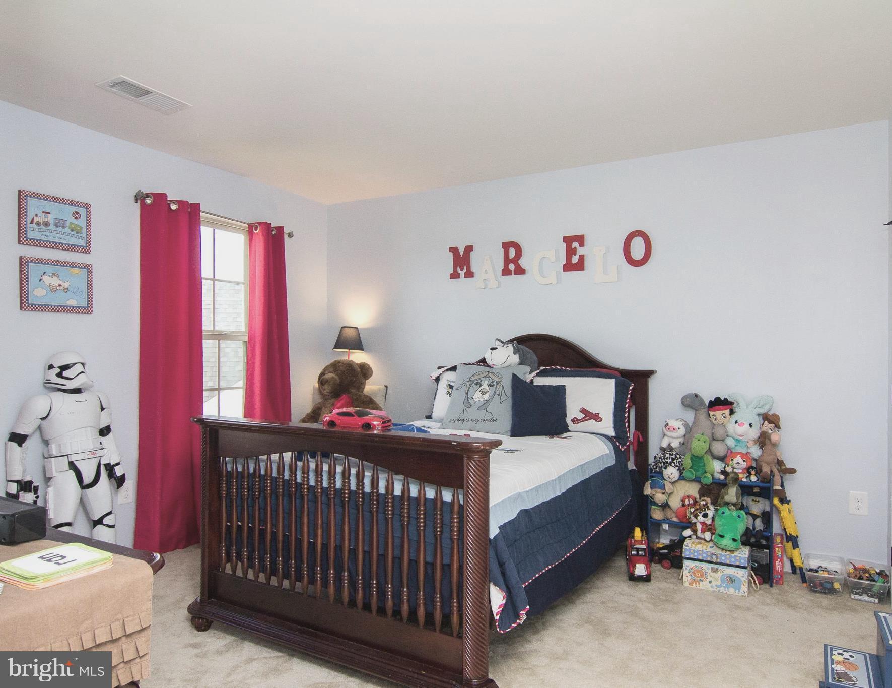 10422 Windlass Run Road Baltimore, MD 21220 - Photo 22 of 30 a bedroom with a bed and a window