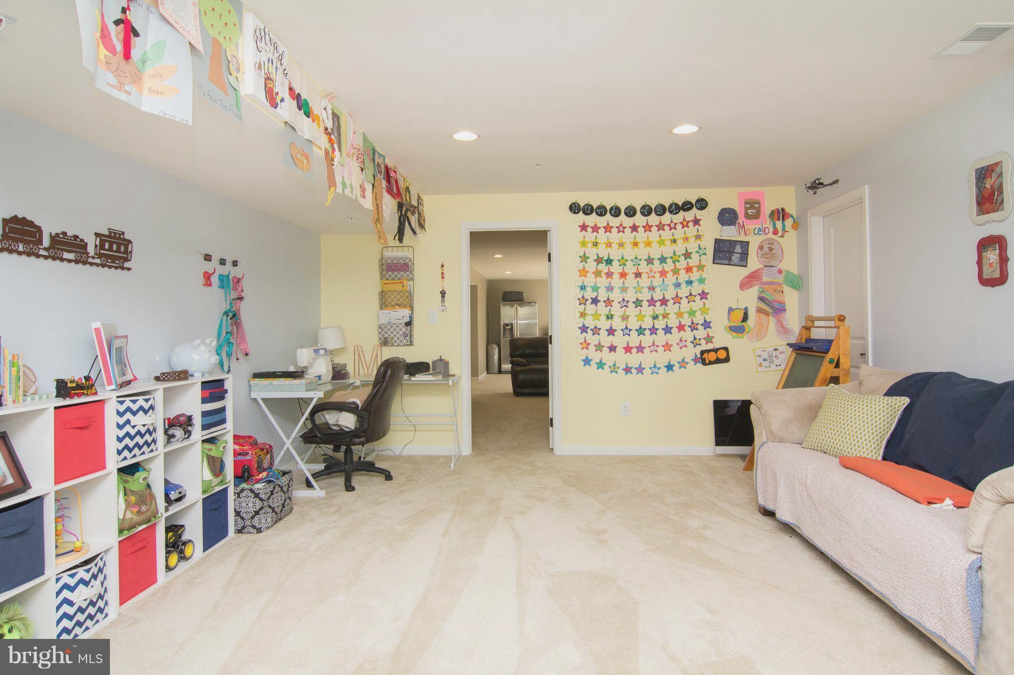 10422 Windlass Run Road Baltimore, MD 21220 - Photo 27 of 30 a workspace with furniture and a rug