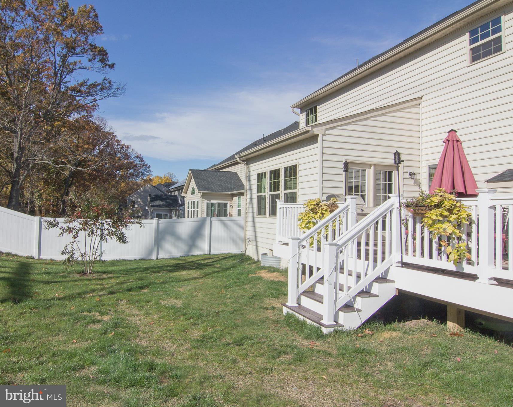 10422 Windlass Run Road Baltimore, MD 21220 - Photo 30 of 30 a view of a house with a yard deck and sitting area