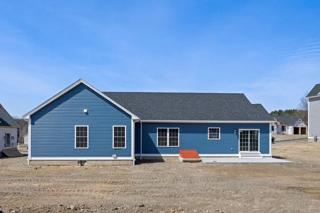 a front view of a house with yard