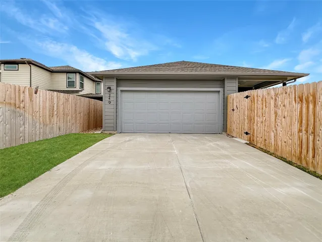a view of garage with garage