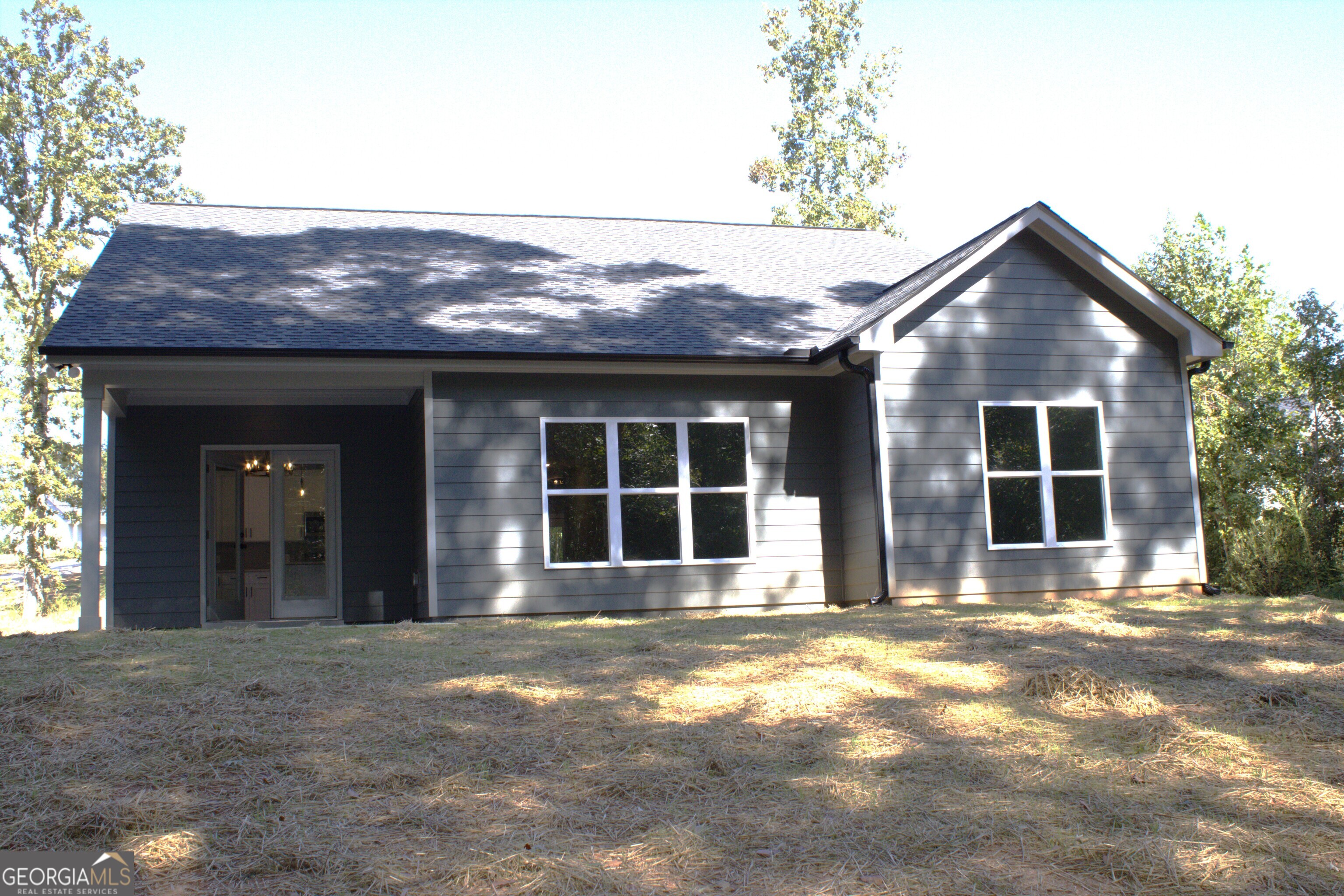 247 North Point Circle Hartwell, GA 30643 - Photo 3 of 18 a front view of a house with a garage