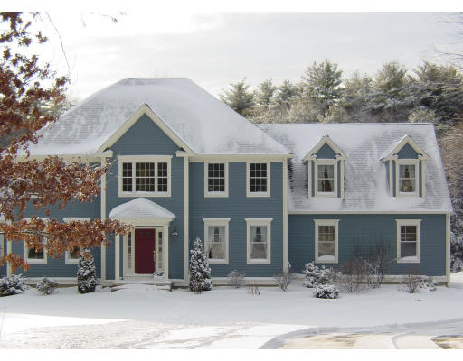 70 Nourse Road Bolton, MA 01740 - Photo 1 of 7 a front view of a house with a yard