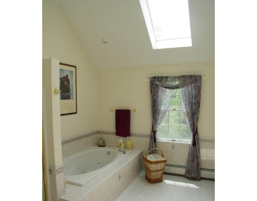 70 Nourse Road Bolton, MA 01740 - Photo 6 of 7 a bathroom with a tub toilet and sink