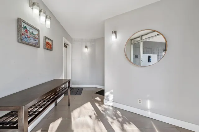 a view of livingroom with furniture and window