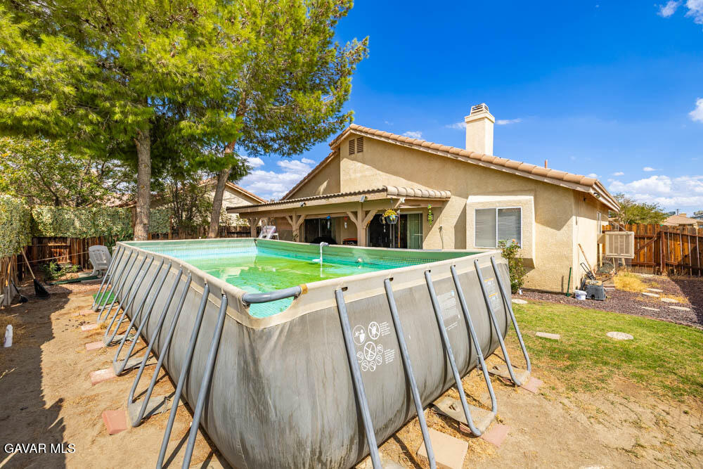 2425 Williams Court Rosamond, CA 93560 - Photo 33 of 35 a view of a house with backyard and sitting area