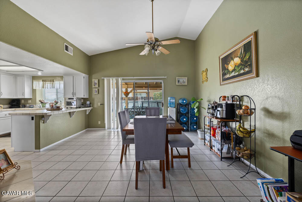 2425 Williams Court Rosamond, CA 93560 - Photo 9 of 35 a dining room with furniture and window