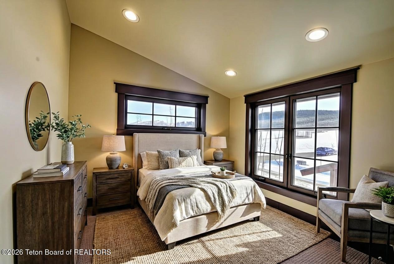 9802 Hiddenwaters Lane Victor, ID 83455 - Photo 29 of 52 Upstairs Bedroom - Virtual Staging