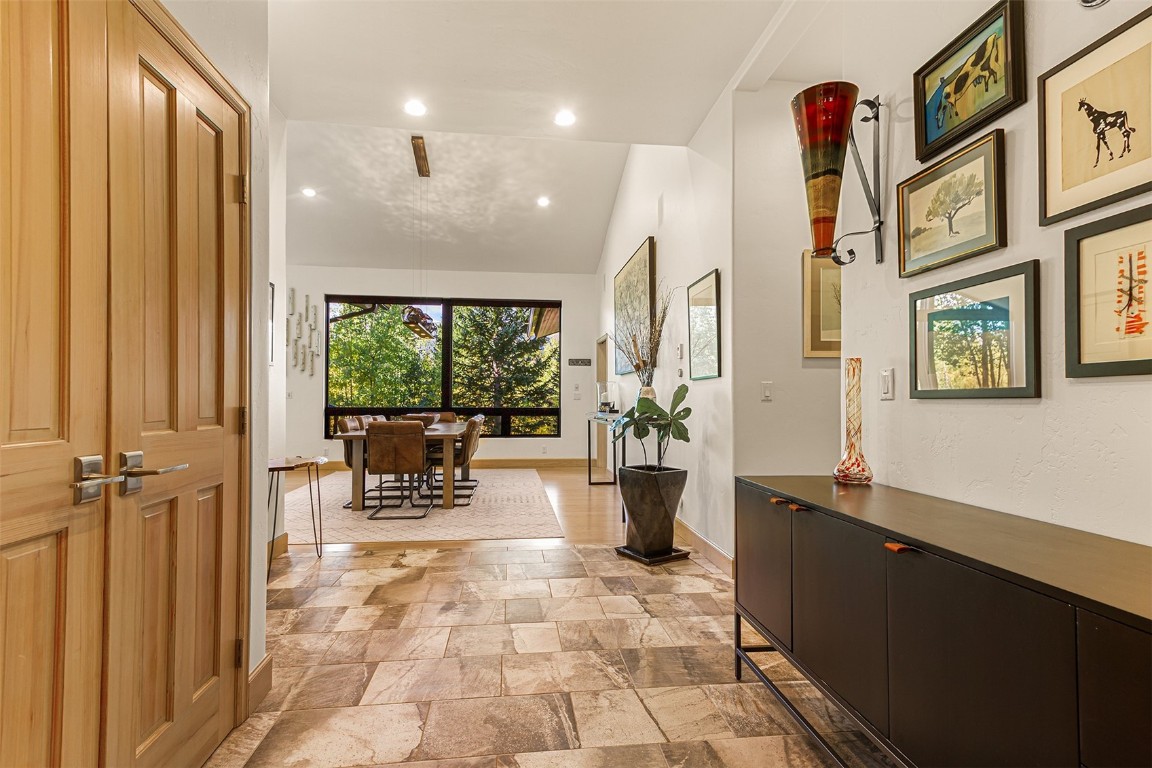 1031 Boreas Pass Road Breckenridge, CO 80424 - Photo 14 of 49 a view of a lobby with furniture and floor to ceiling window