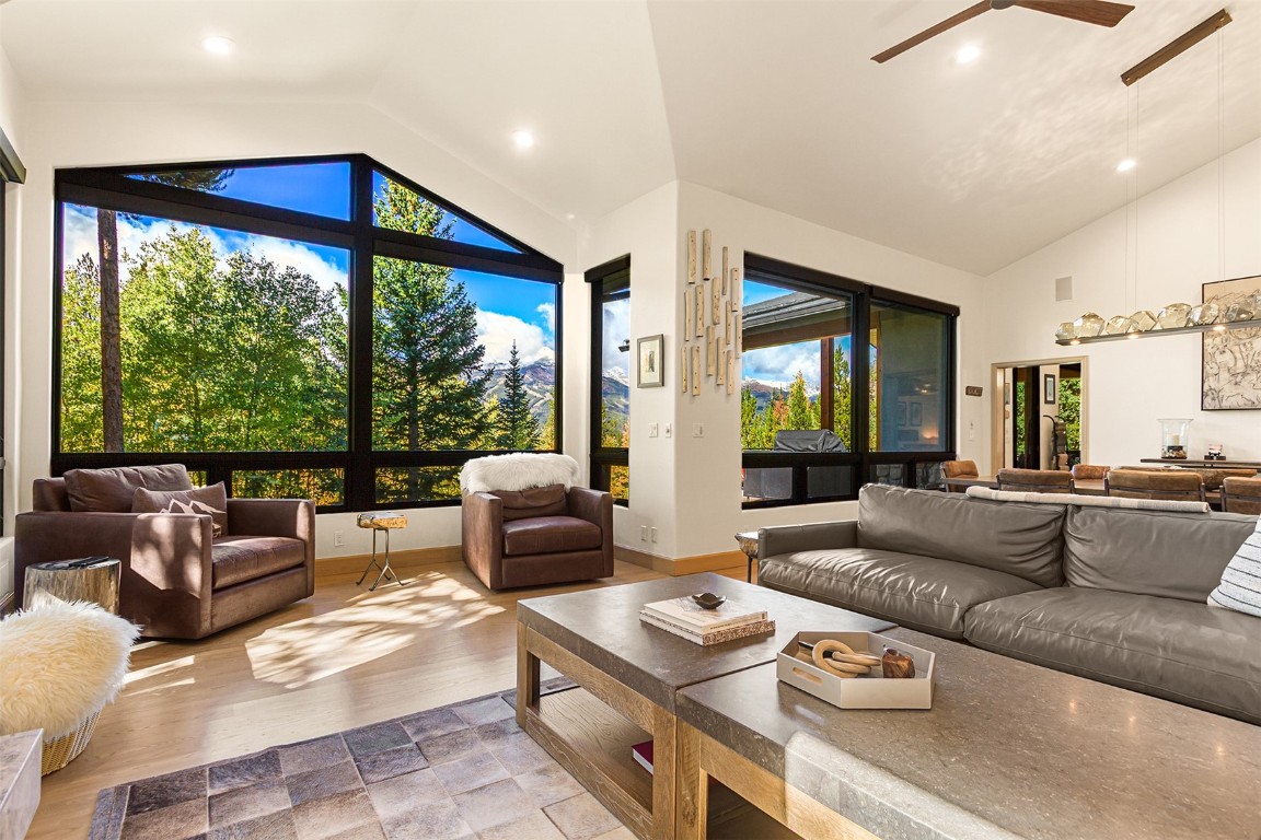 1031 Boreas Pass Road Breckenridge, CO 80424 - Photo 18 of 49 a living room with furniture and a large window