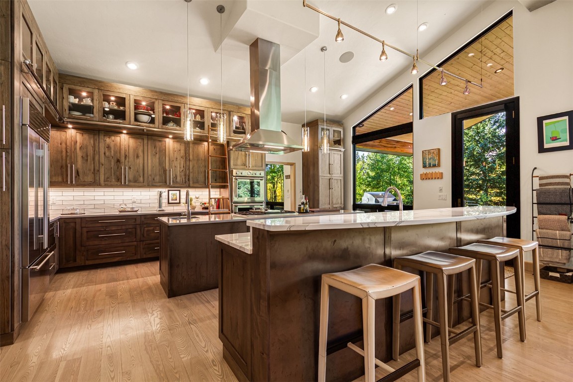 1031 Boreas Pass Road Breckenridge, CO 80424 - Photo 19 of 49 a kitchen with a sink and stove