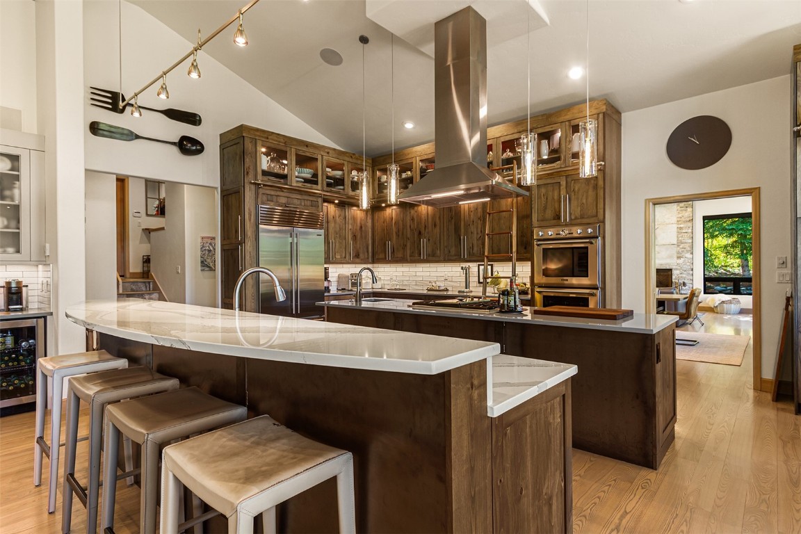 1031 Boreas Pass Road Breckenridge, CO 80424 - Photo 25 of 49 a kitchen with a table and chairs in it