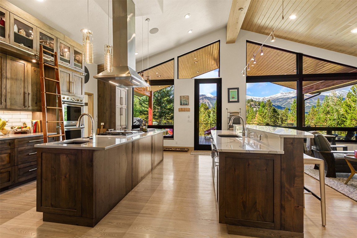 1031 Boreas Pass Road Breckenridge, CO 80424 - Photo 4 of 49 a living room with large windows and furniture