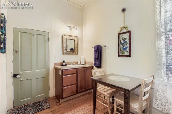 a room with a table and chairs