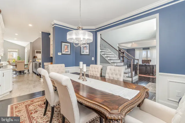 a kitchen with stainless steel appliances kitchen island granite countertop a sink and cabinets
