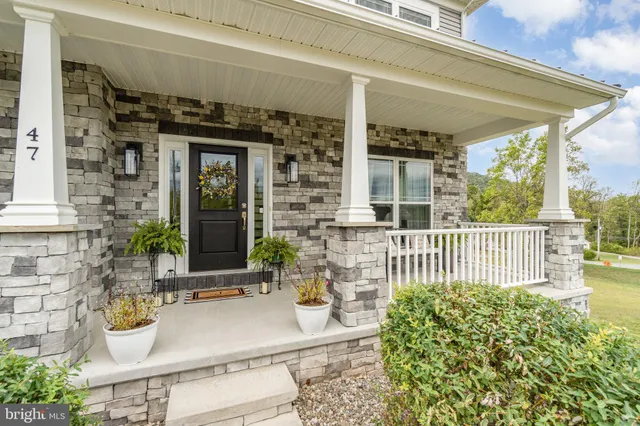 a view of a town with mountains in the background