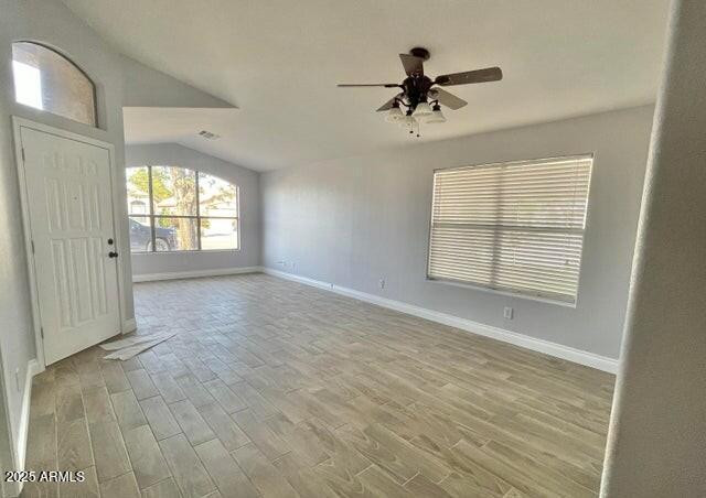 12817 West Alvarado Road Avondale, AZ 85392 - Photo 5 of 15 a view of an empty room with a window