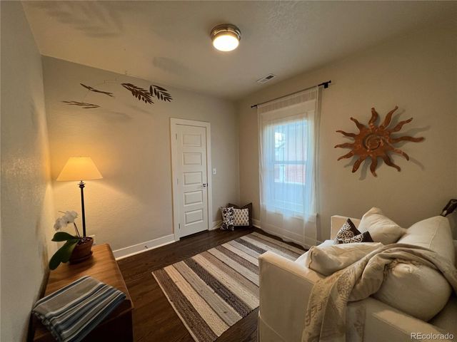 a bed room with a bed and a couch