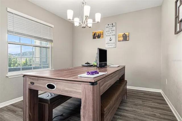a kitchen with a stove and a table