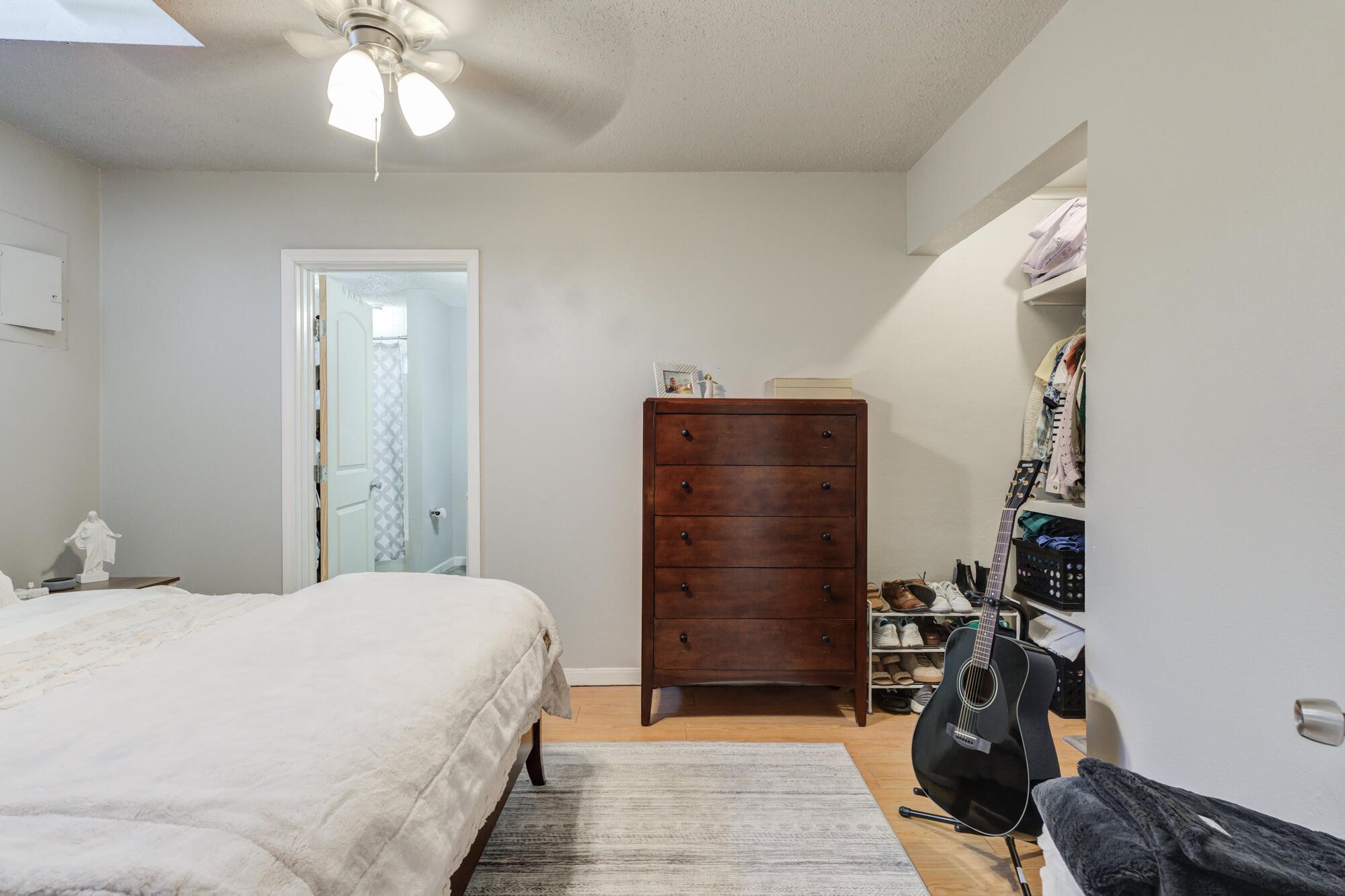2601 25th Street Lubbock, TX 79410 - Photo 18 of 30 a bedroom with a bed and a closet