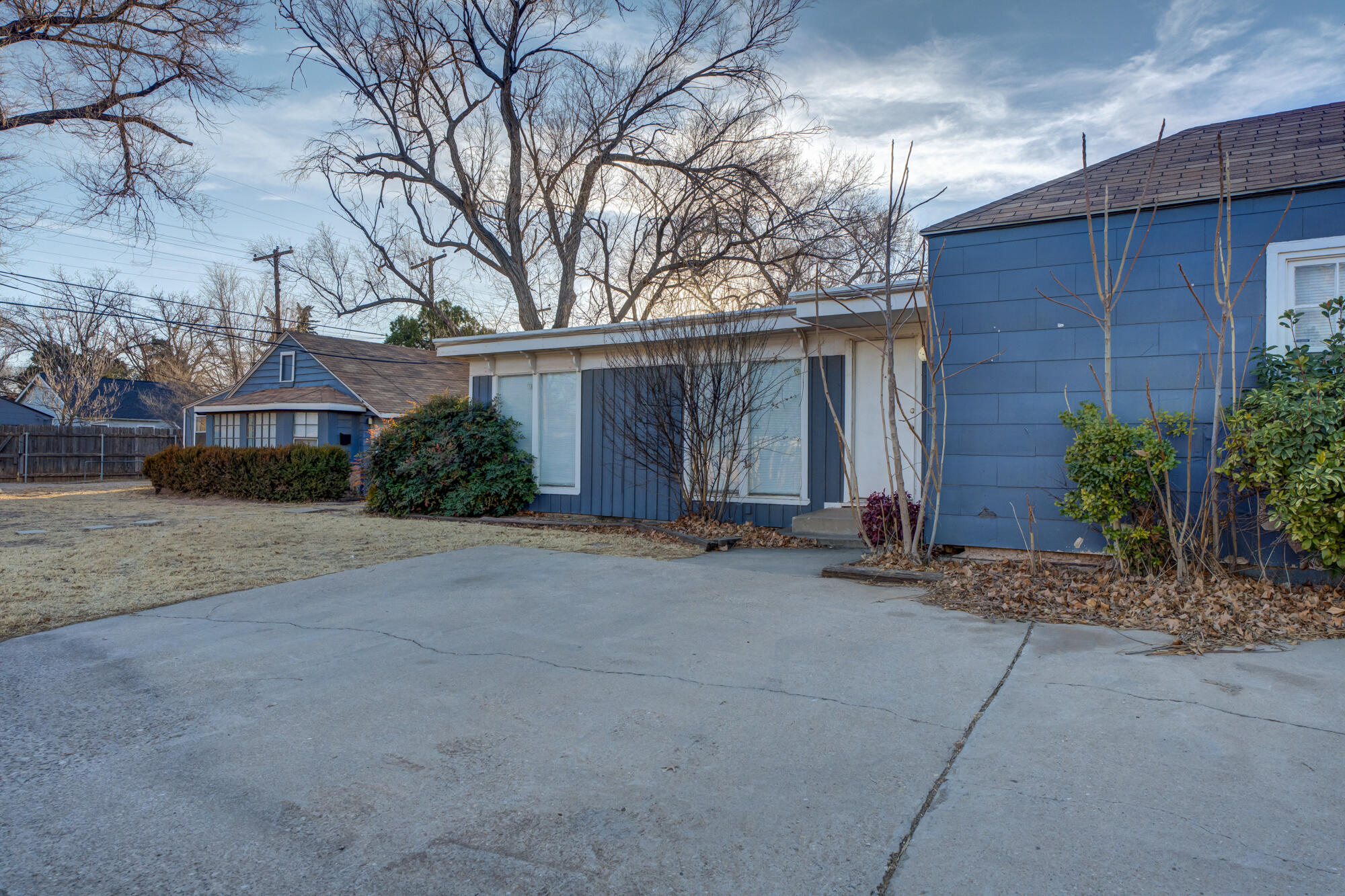 2601 25th Street Lubbock, TX 79410 - Photo 6 of 30 a view of the house with backyard space and trees