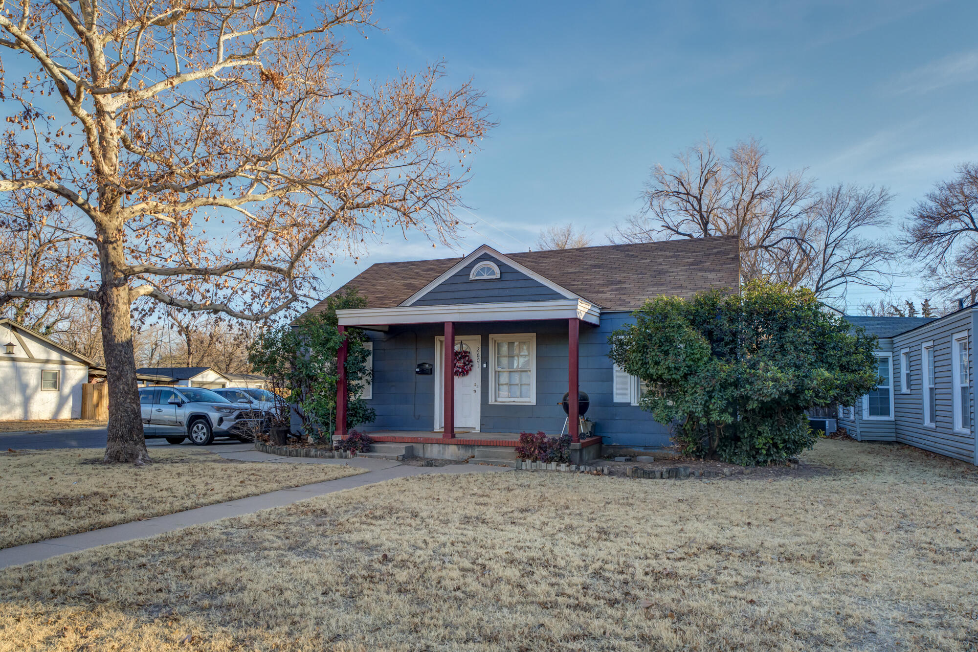 2601 25th Street Lubbock, TX 79410 - Photo 7 of 30 a front view of a house with garden