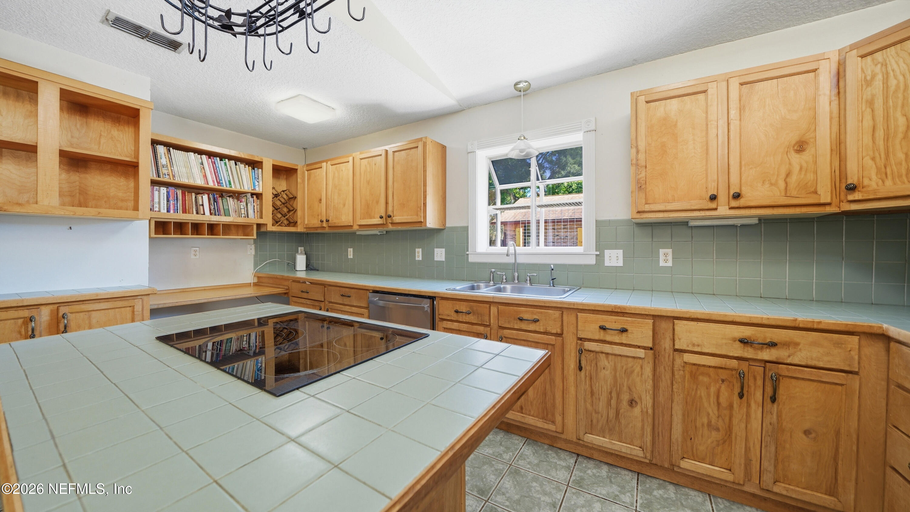 2216 Brentfield Road Jacksonville, FL 32225 - Photo 11 of 62 a kitchen that has a sink and window