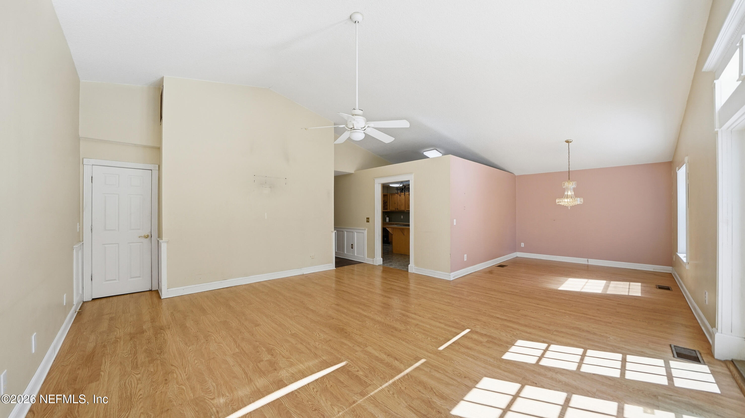 2216 Brentfield Road Jacksonville, FL 32225 - Photo 13 of 62 a view of a room with a ceiling fan and entryway