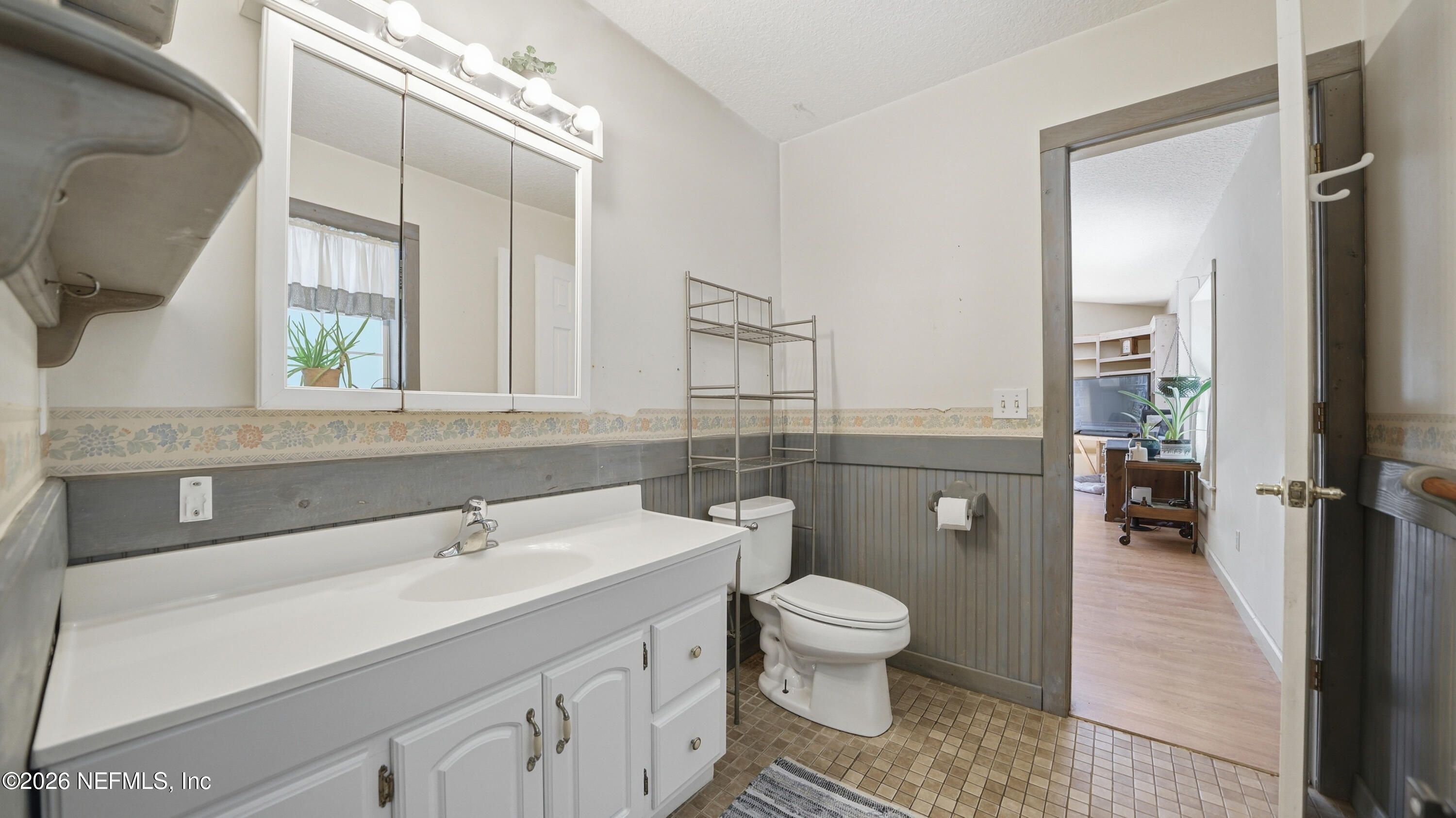 2216 Brentfield Road Jacksonville, FL 32225 - Photo 23 of 62 a bathroom with a sink toilet and shower