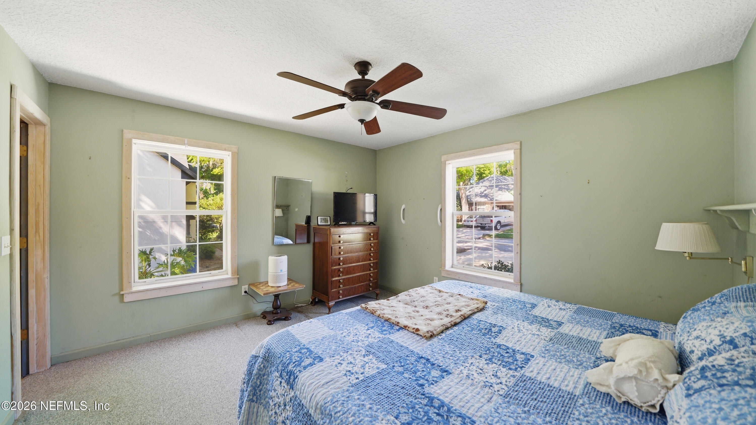 2216 Brentfield Road Jacksonville, FL 32225 - Photo 25 of 62 a bedroom with a bed and a window