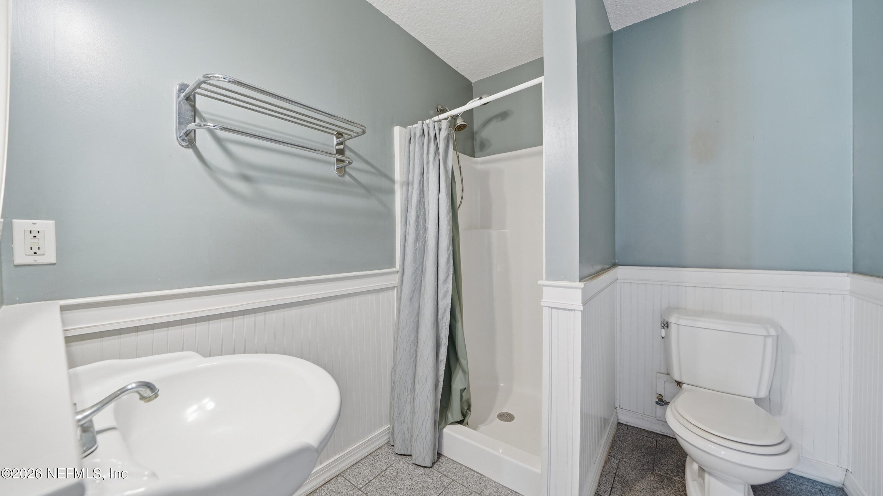 2216 Brentfield Road Jacksonville, FL 32225 - Photo 32 of 62 a bathroom with a toilet and a sink