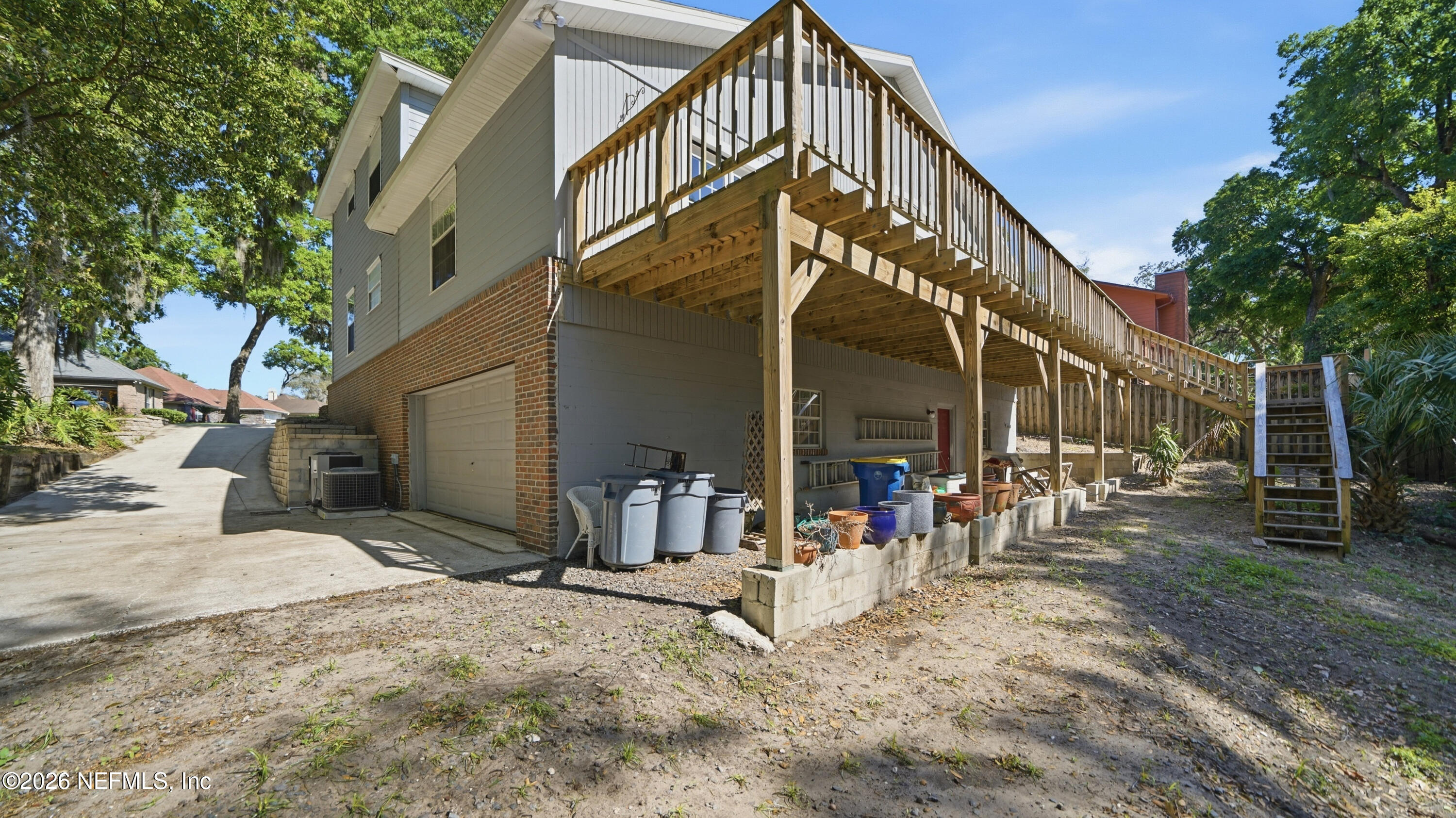 2216 Brentfield Road Jacksonville, FL 32225 - Photo 52 of 62 a view of a house with a yard and sitting area