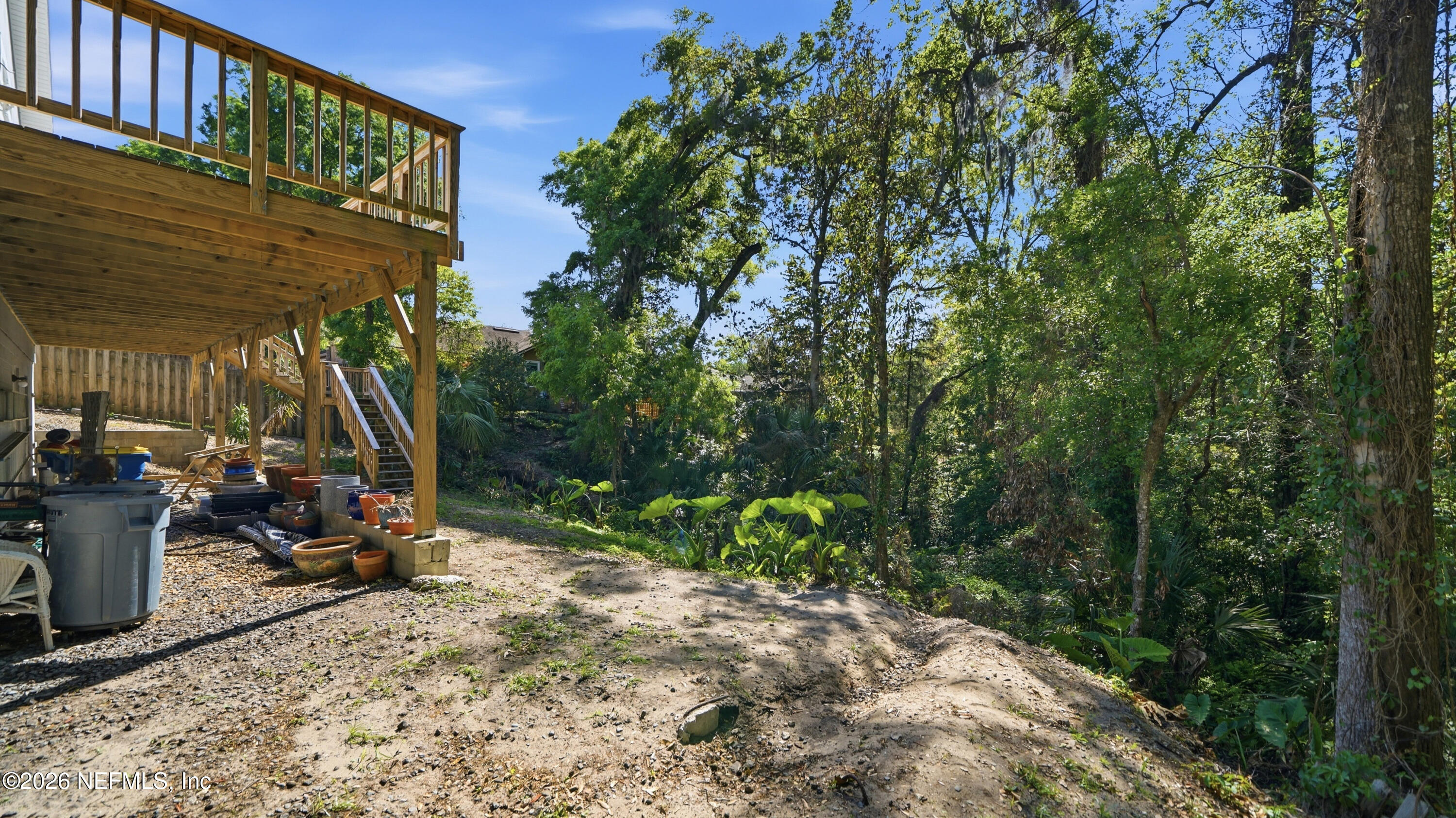 2216 Brentfield Road Jacksonville, FL 32225 - Photo 53 of 62 a view of a chair and table in the backyard