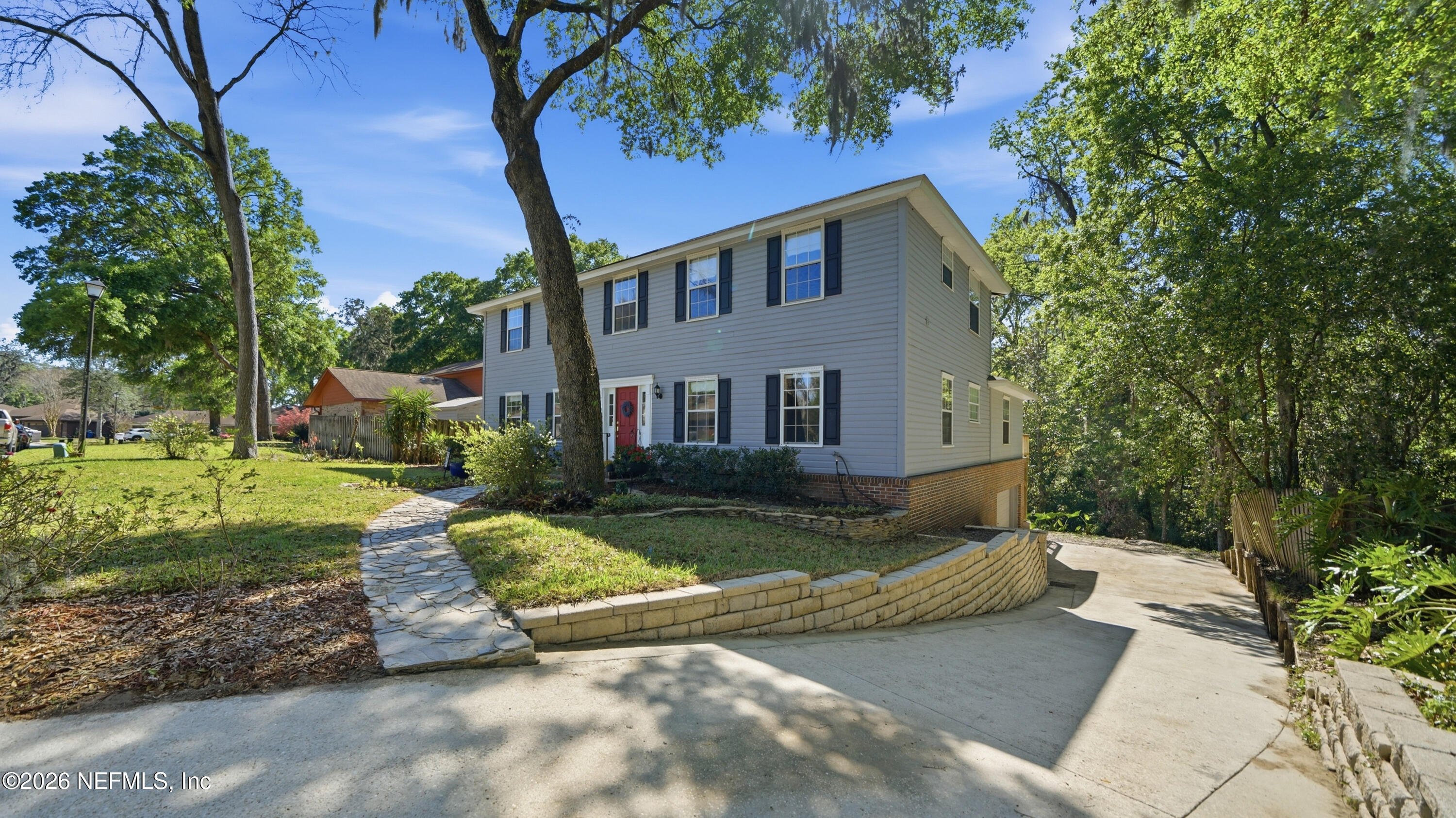 2216 Brentfield Road Jacksonville, FL 32225 - Photo 56 of 62 a view of a house with a yard
