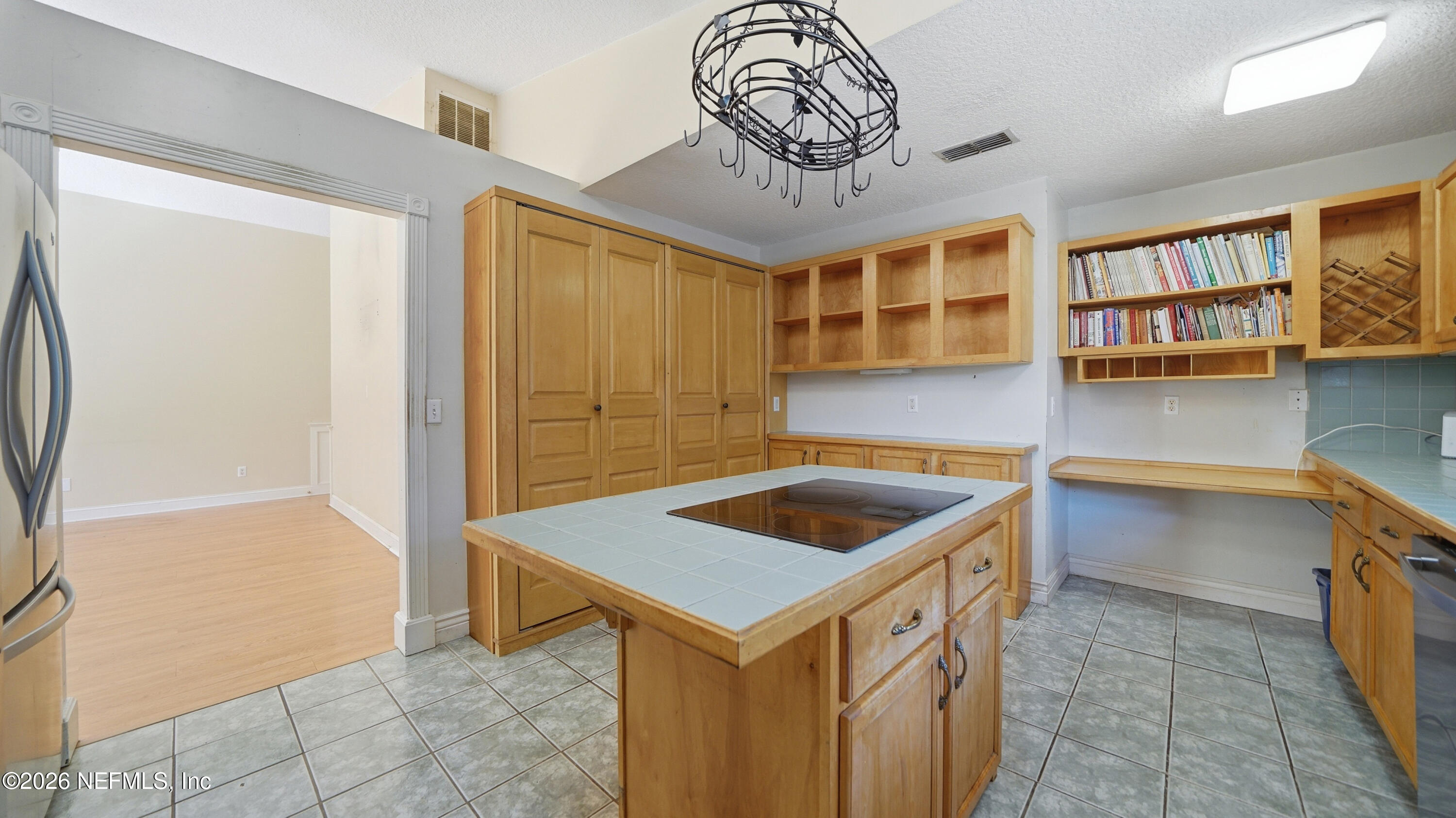 2216 Brentfield Road Jacksonville, FL 32225 - Photo 10 of 62 a kitchen that has a sink and a stove