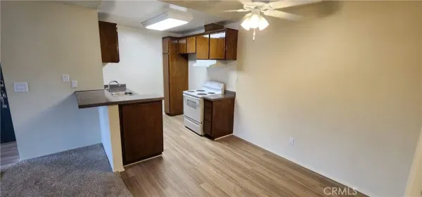 a kitchen with a stove and a microwave