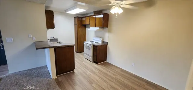 a room with a sink and a mirror