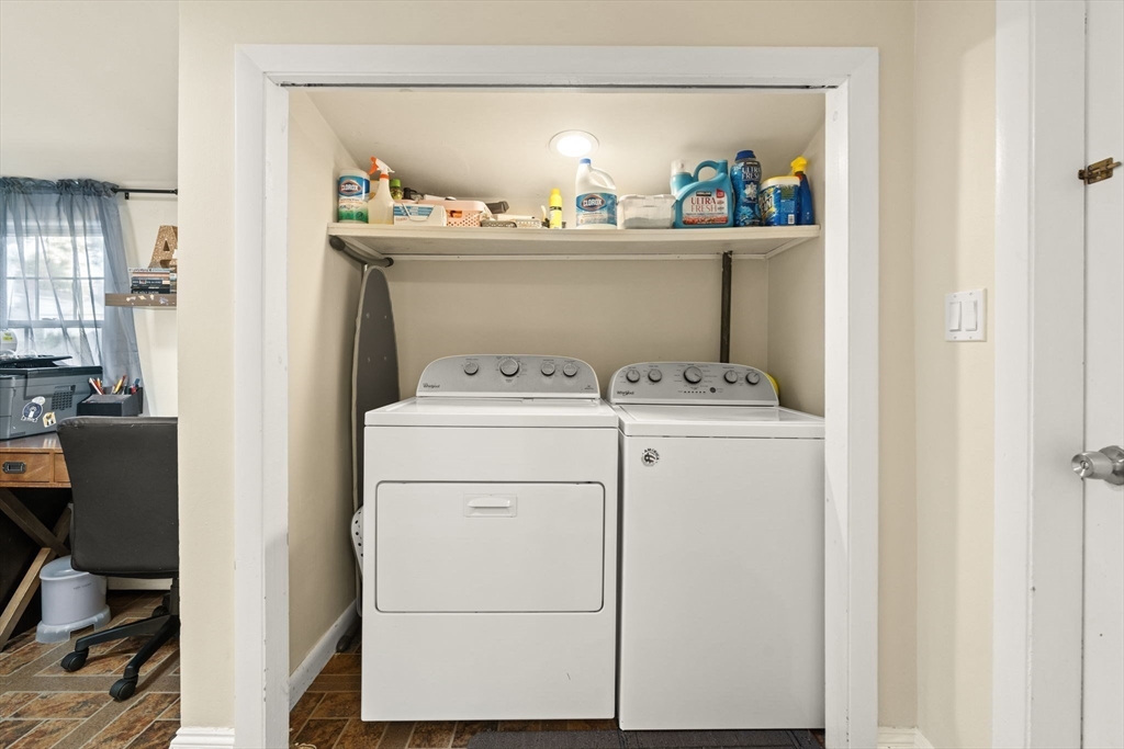 48 Tapped Street Everett, MA 02149 - Photo 20 of 24 a utility room with dryer washer and a view of living area