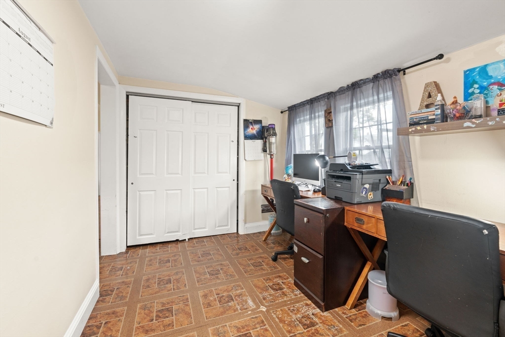 48 Tapped Street Everett, MA 02149 - Photo 21 of 24 a view of a workspace with furniture and window