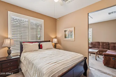 a bedroom with a bed and furniture