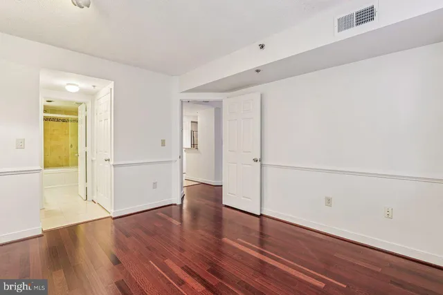 a view of a livingroom with wooden floor