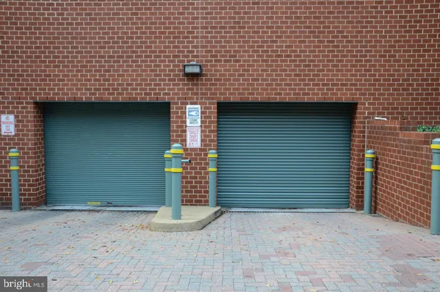 a front view of a house with a garage