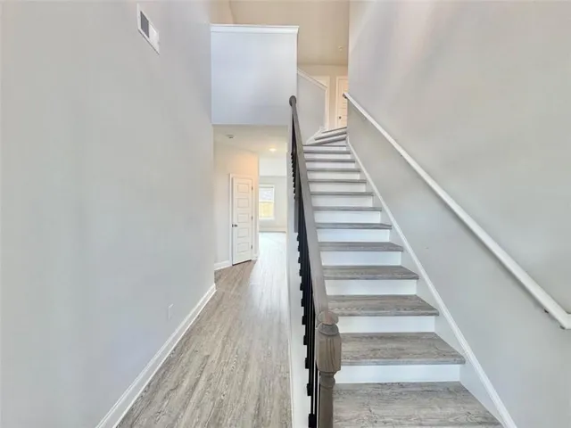 a view of entryway with wooden floor