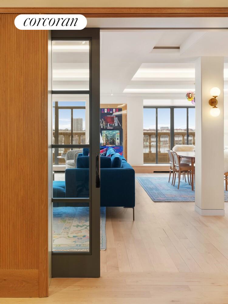 140 Riverside Drive, Unit 19HO Manhattan, NY 10024 - Photo 31 of 35 a living room with furniture and a table
